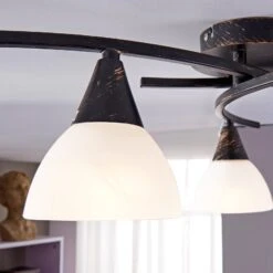 Dreiflammige Deckenlampe Della, Schwarz-gold -Philips Store 9620970 5